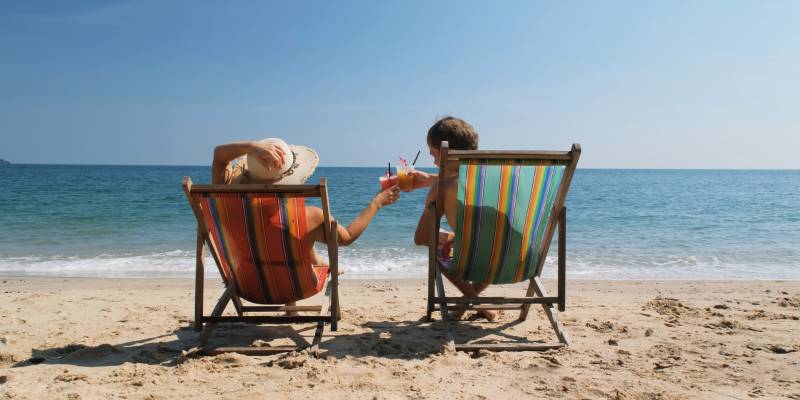 Couple resting on beach